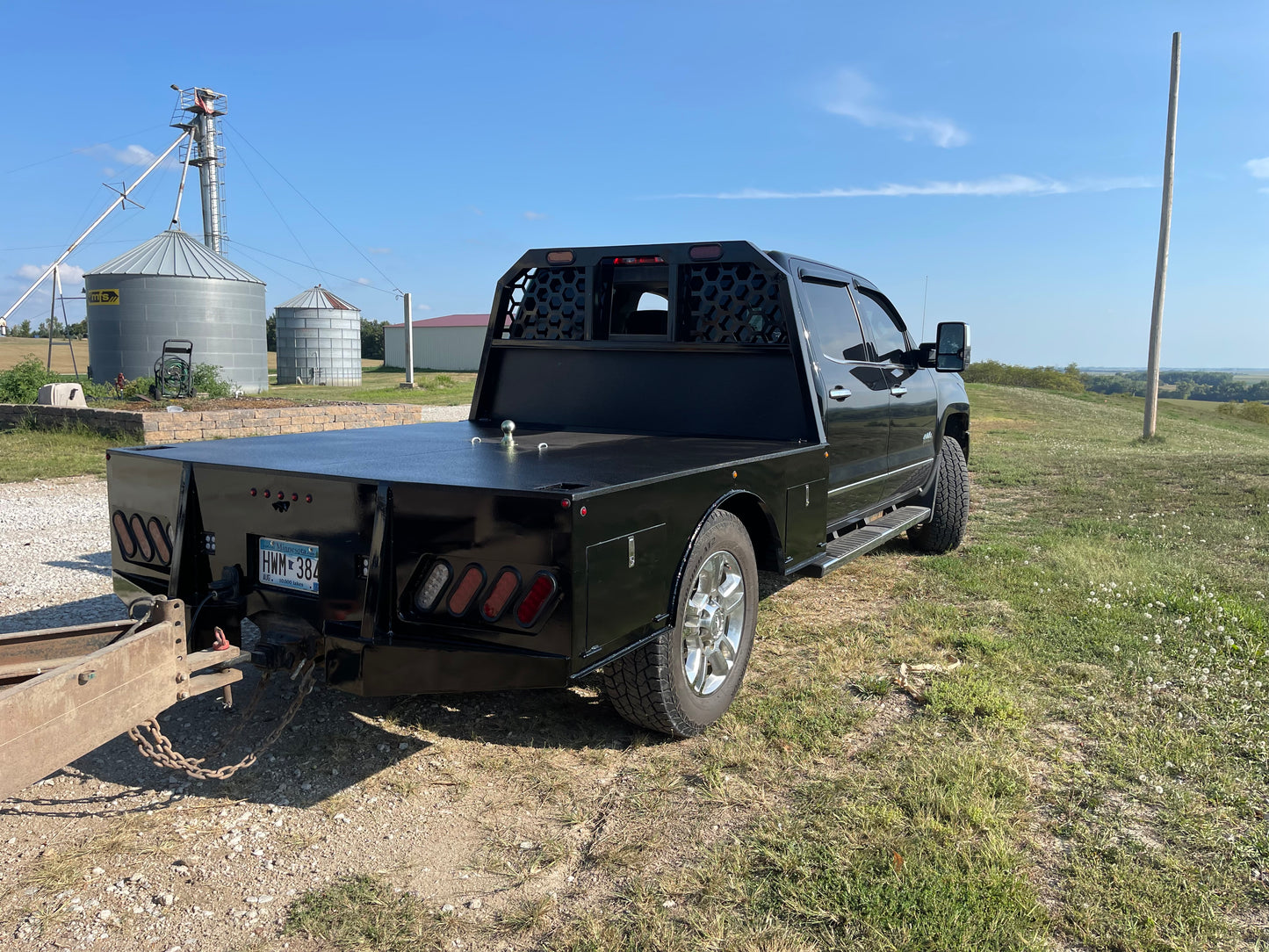 Skirted flat bed with belly boxes